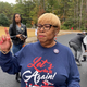 Helen Butler, executive director of The Georgia Coalition for the People’s Agenda, speaks to organizers at a Black church tradition event known as “Souls to the Polls” in Decatur, Ga., Sunday, Oct. 30, 2022.